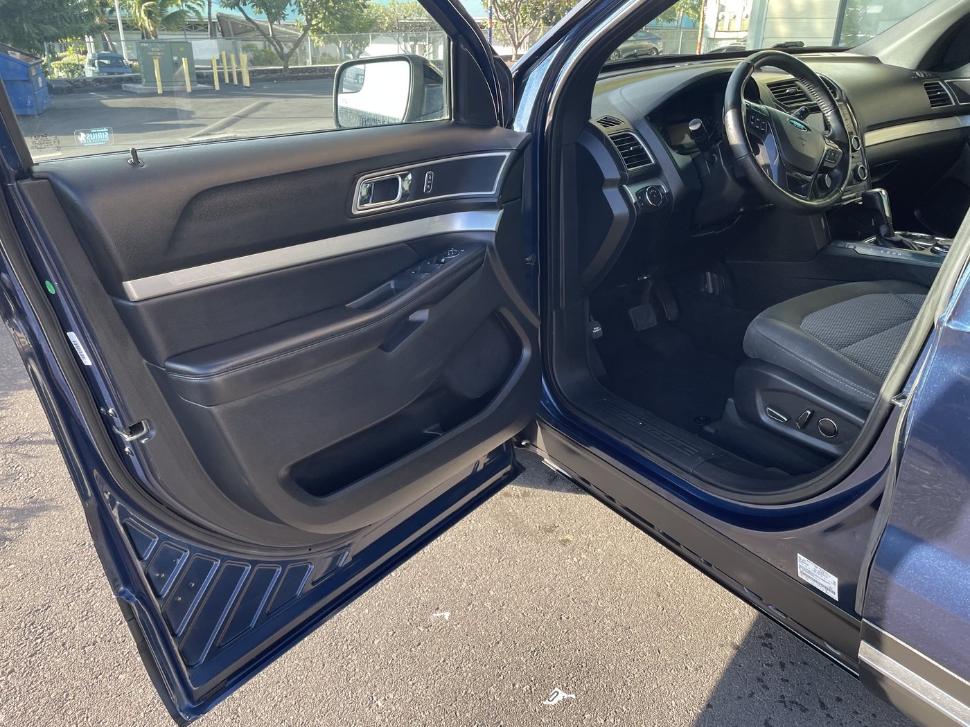 Spotless detailed SUV interior with the door open, cleaned by SilvaShine